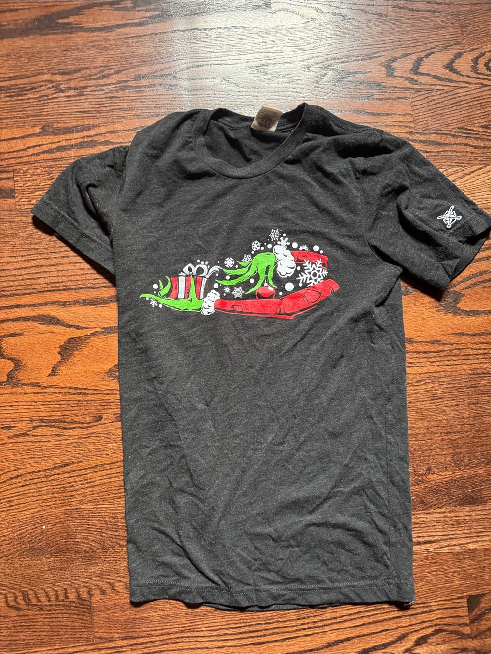 Black Graphic Tee with Green & Red Holiday Grinch Art